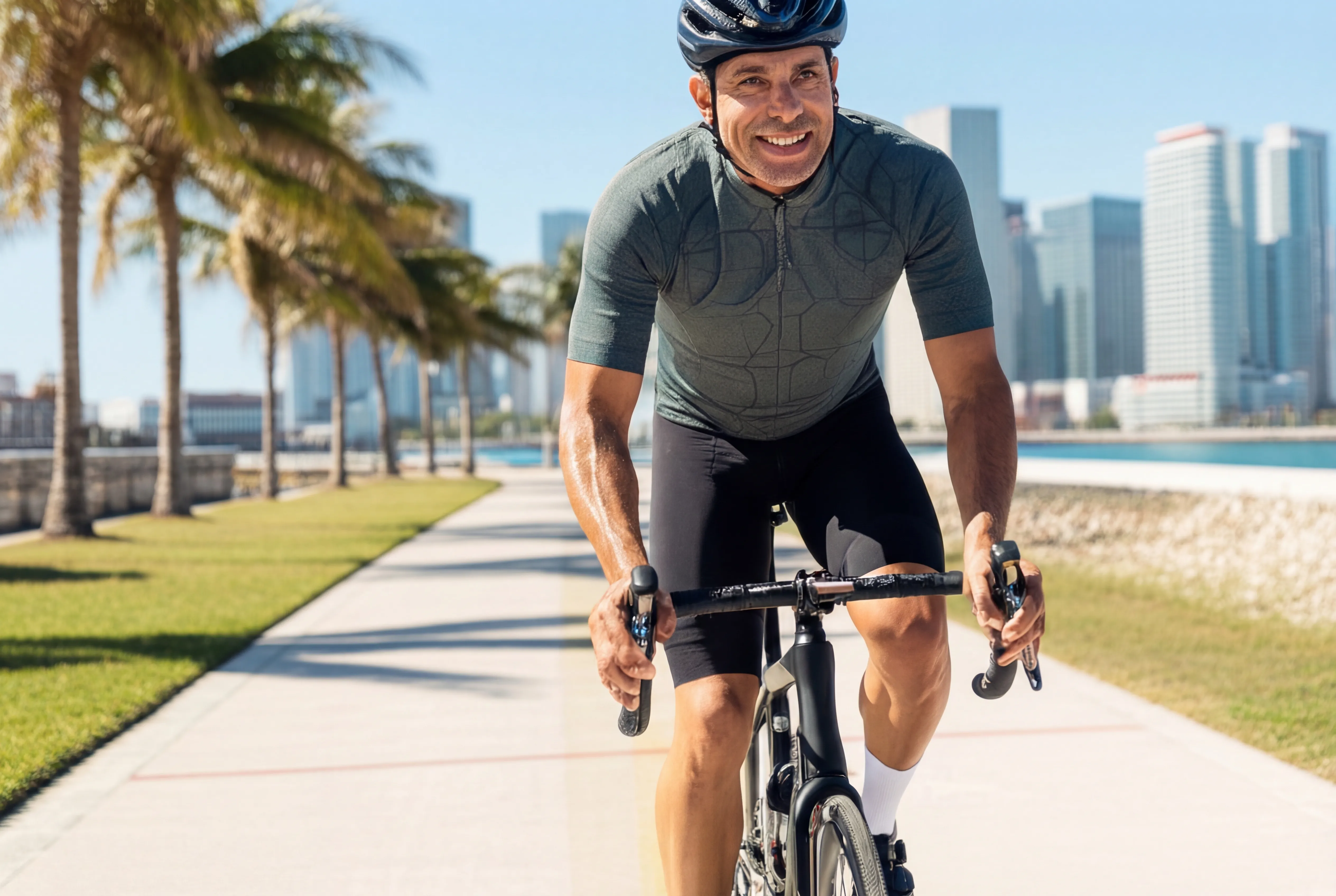 Active person cycling outdoors after recovering from piriformis syndrome